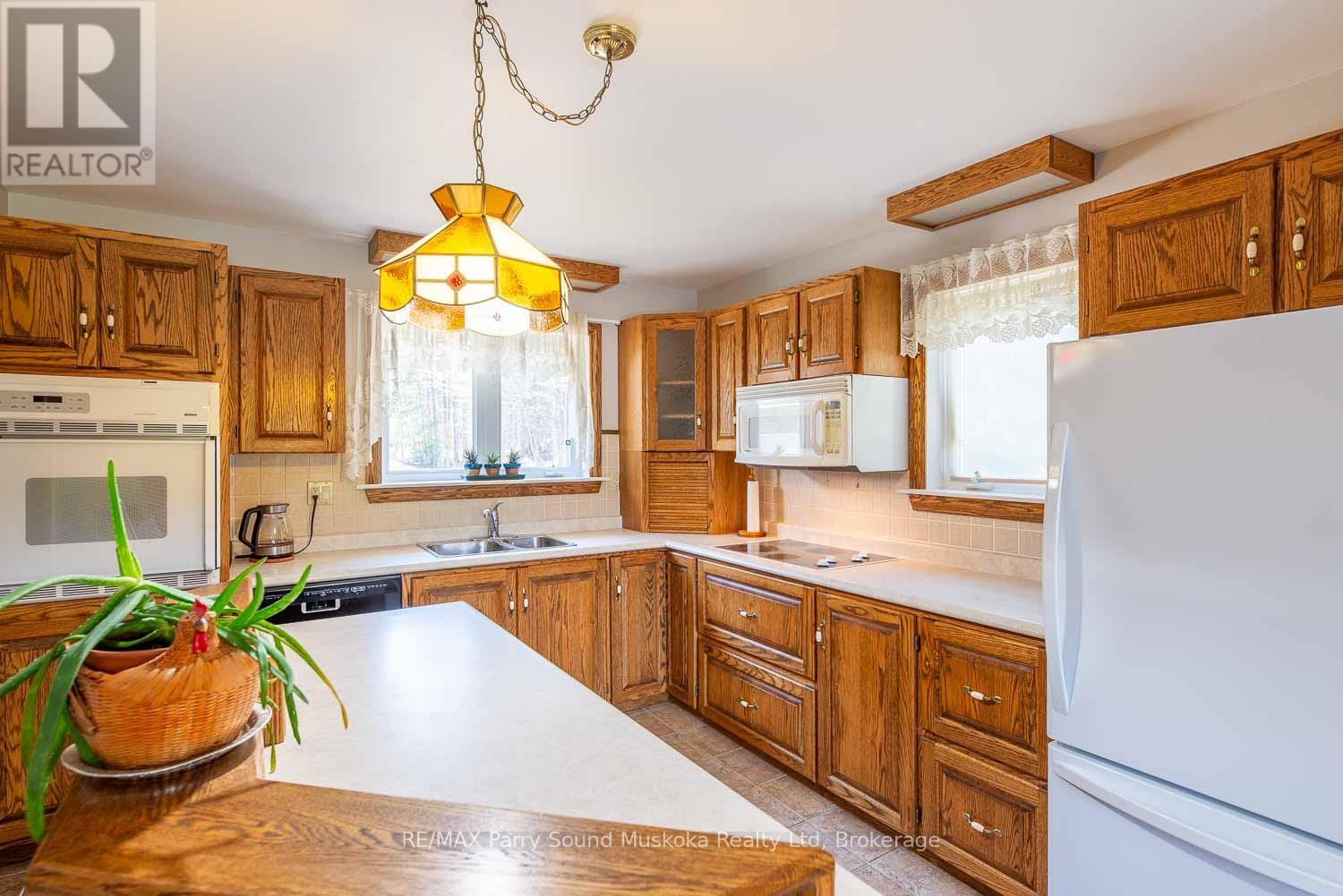 Photo 9 of 1889 South Horn Lake Road, Magnetawan ON