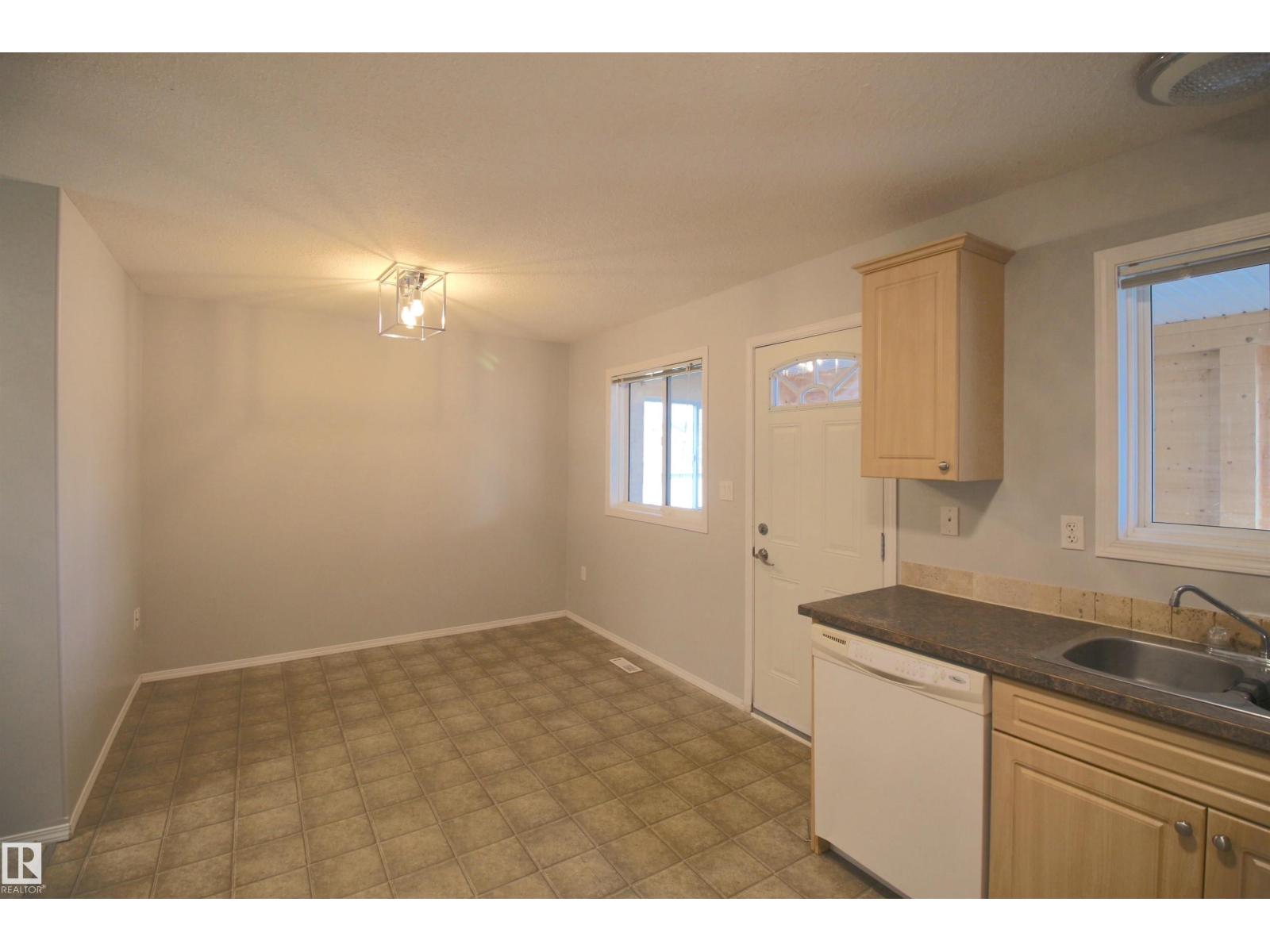 Photo 23 of 5002 52 Av, Calmar AB