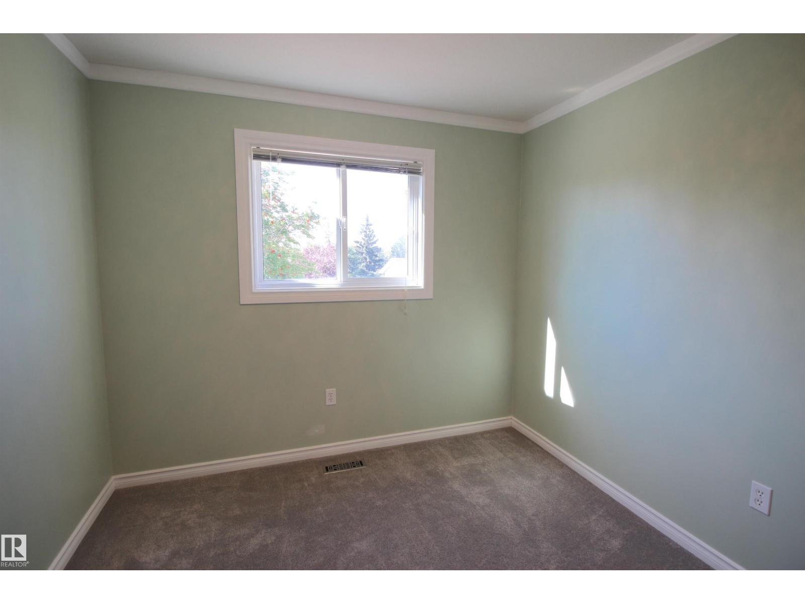 Photo 41 of 5002 52 Av, Calmar AB