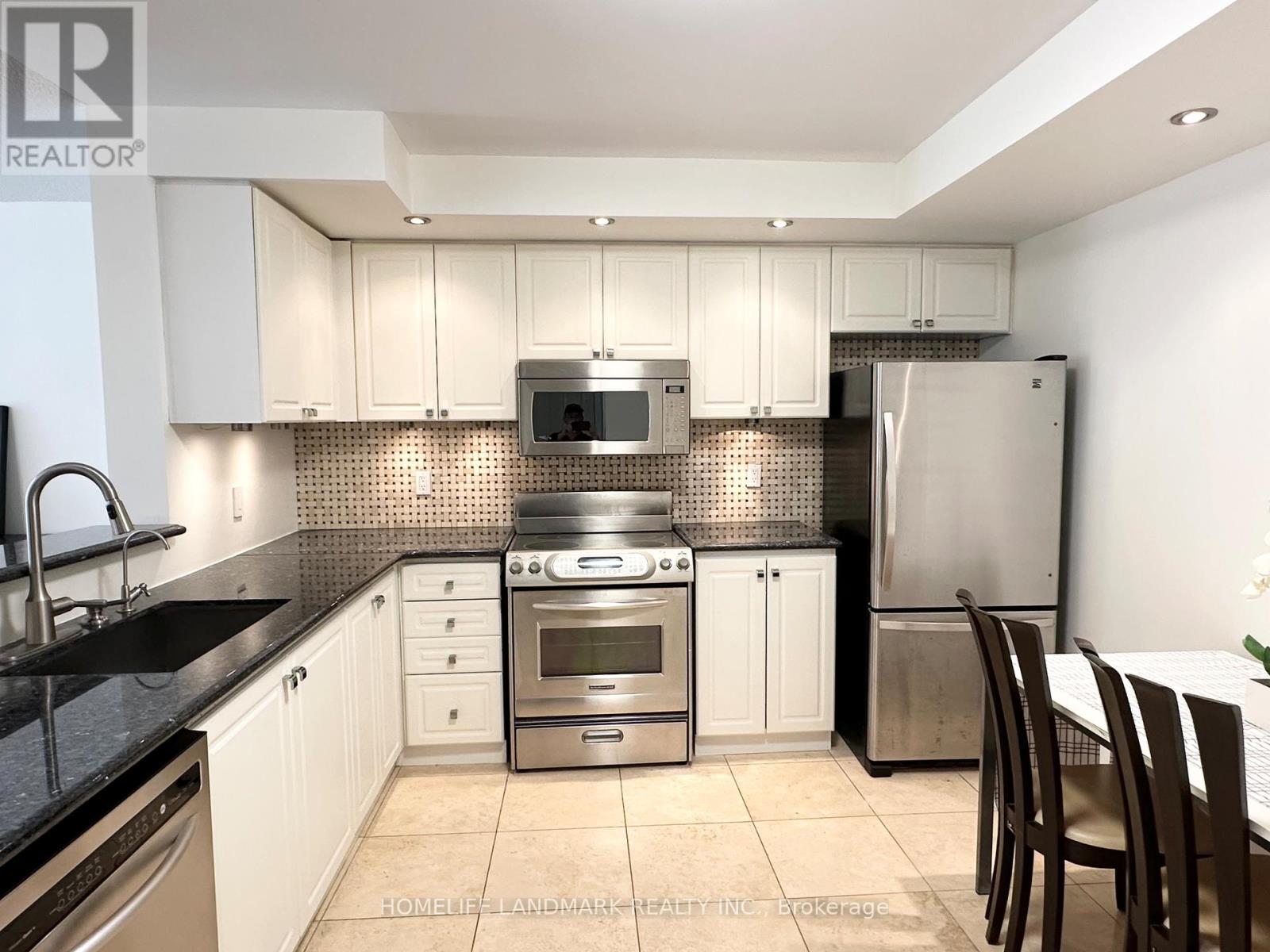 Photo 8 of 558 1881 Mcnicoll Avenue, Toronto ON