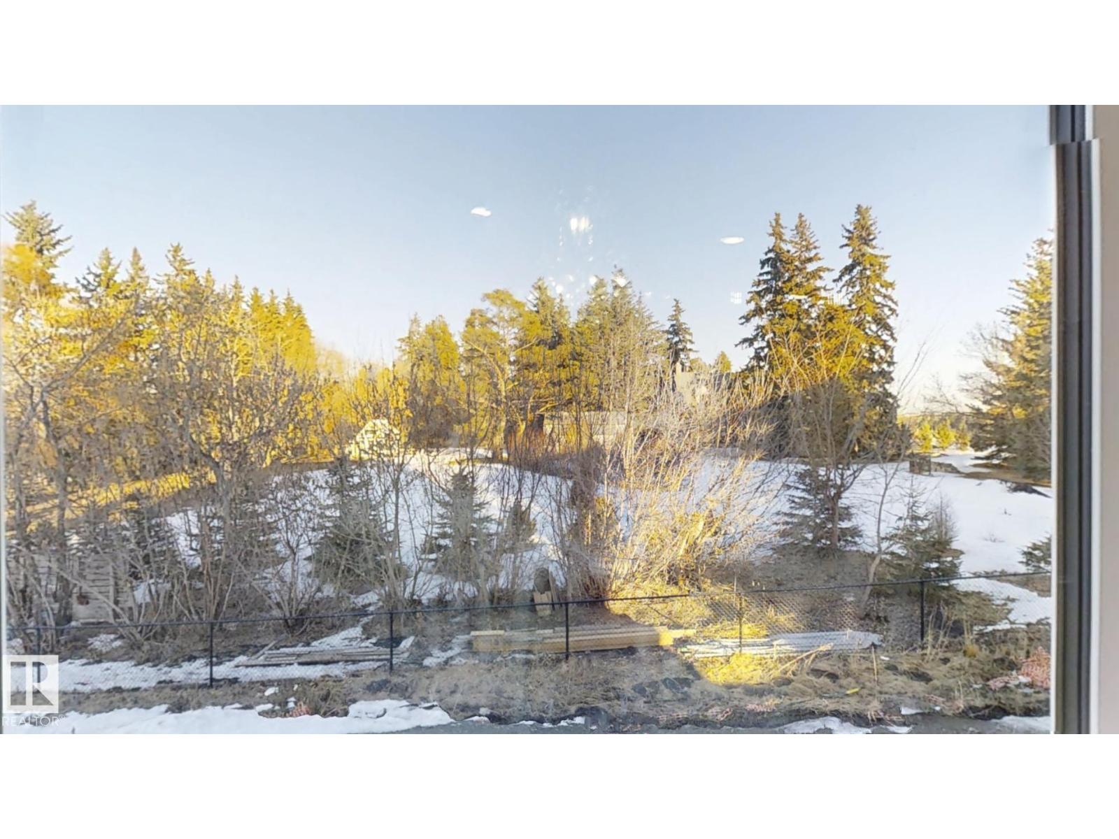 Photo 10 of 215 Glenridding Ravine Rd Sw, Edmonton AB