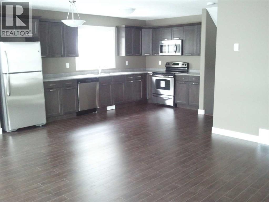 Photo 10 of 7414 115 A Street, Grande Prairie AB