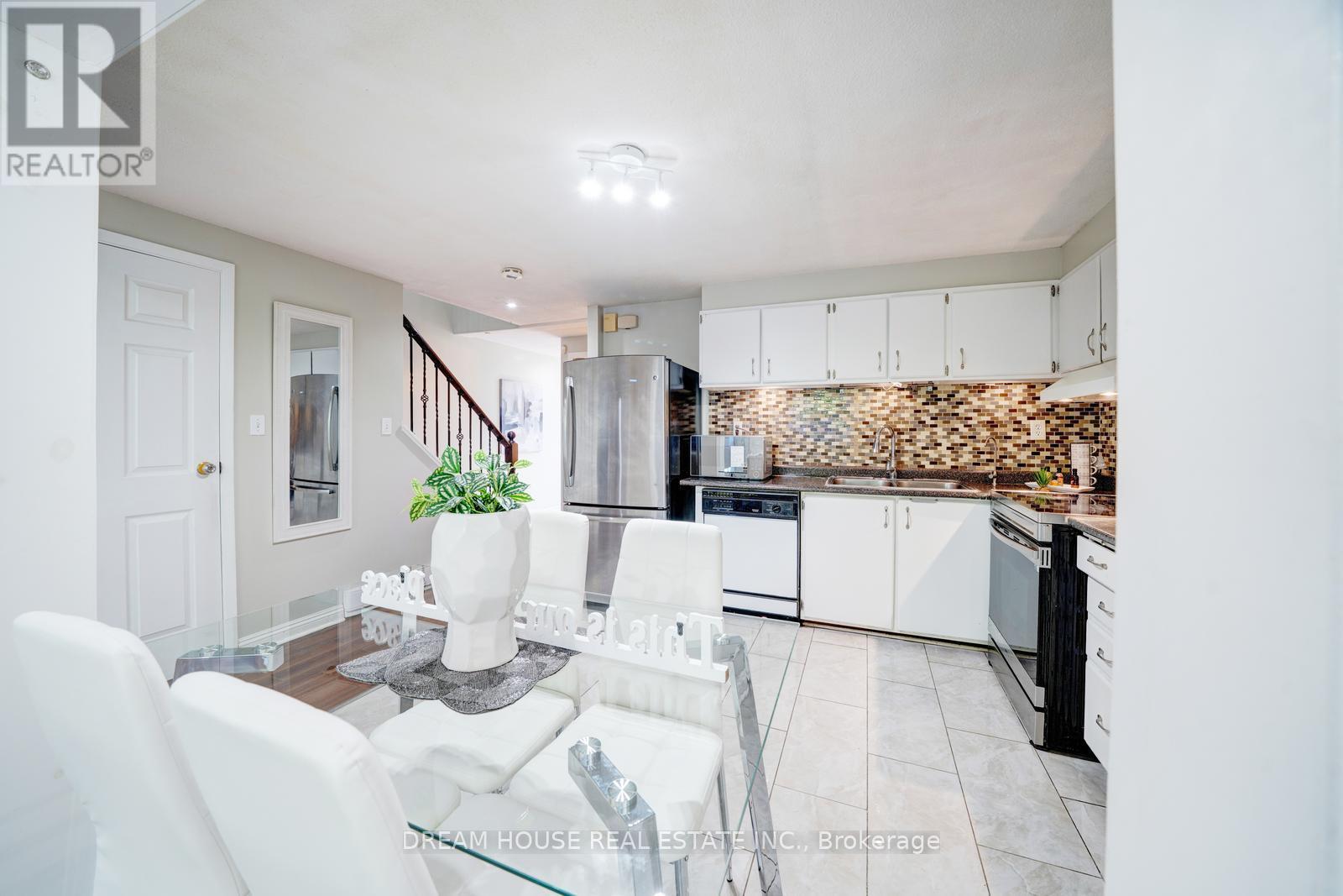 Photo 10 of 106 850 Huntingwood Drive, Toronto ON
