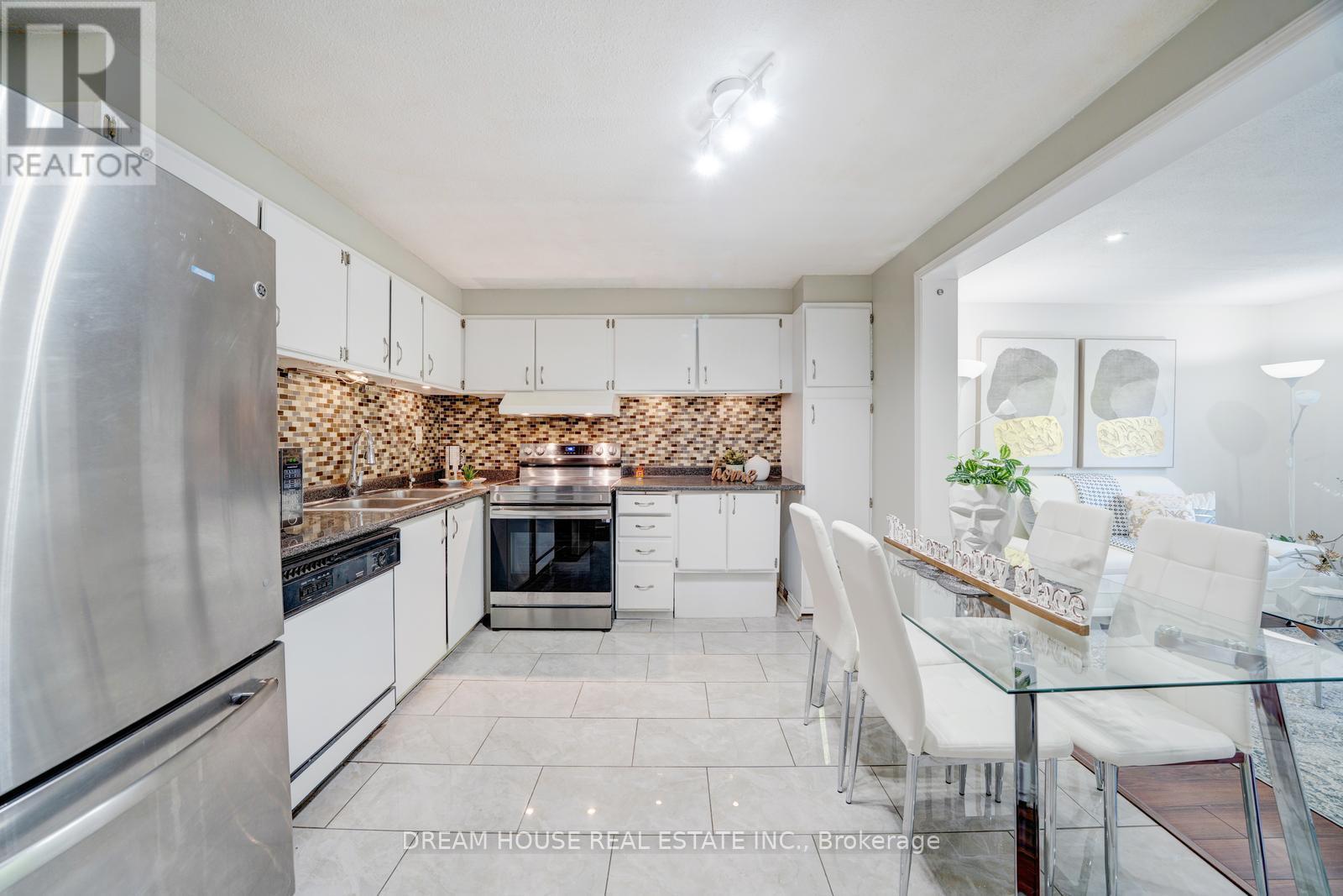Photo 12 of 106 850 Huntingwood Drive, Toronto ON