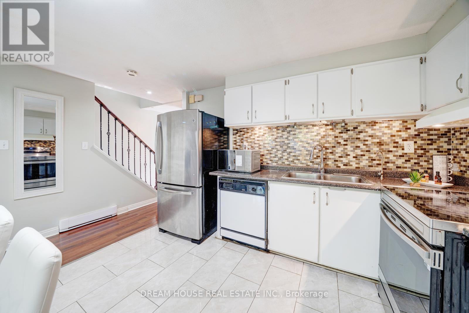 Photo 13 of 106 850 Huntingwood Drive, Toronto ON