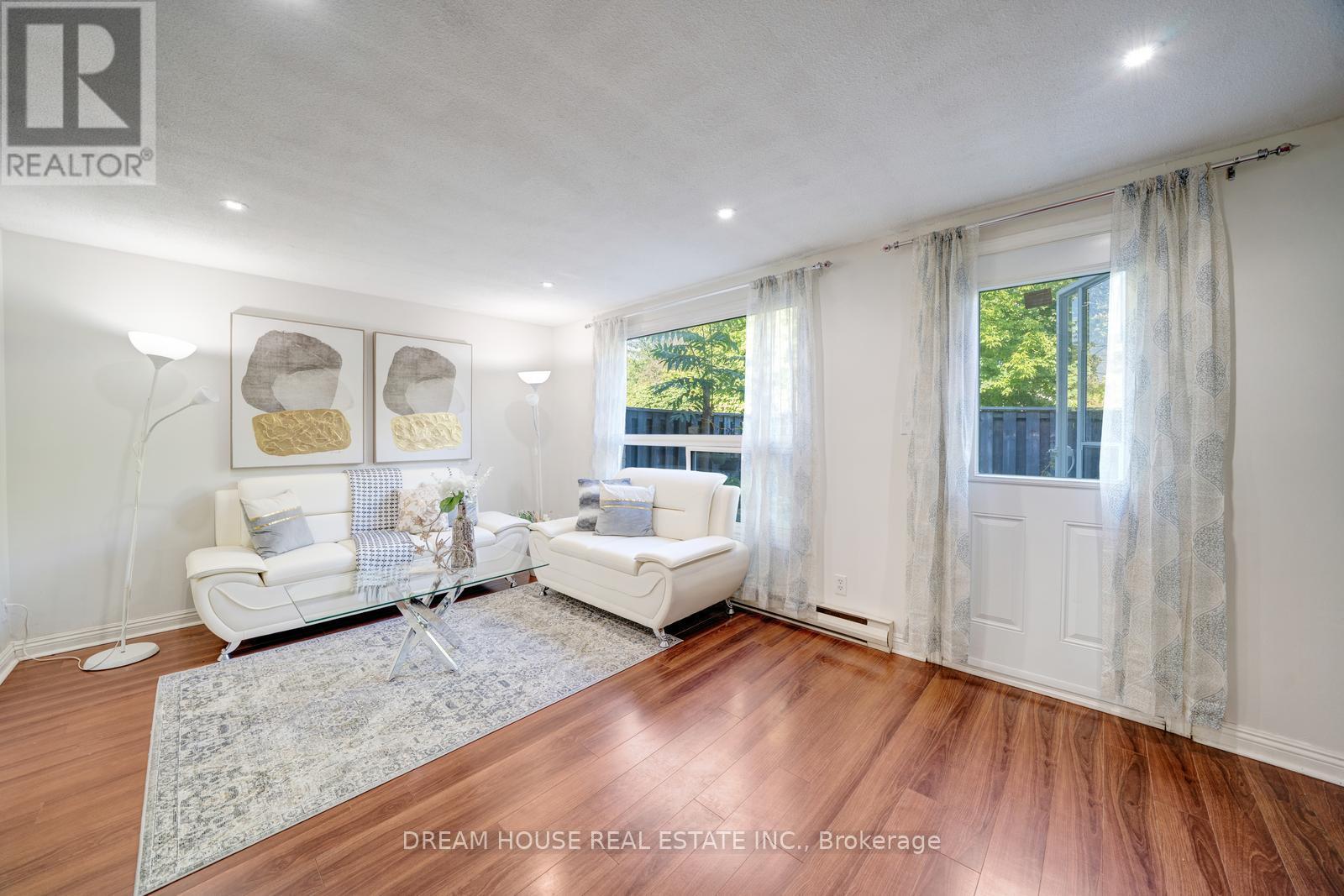 Photo 5 of 106 850 Huntingwood Drive, Toronto ON