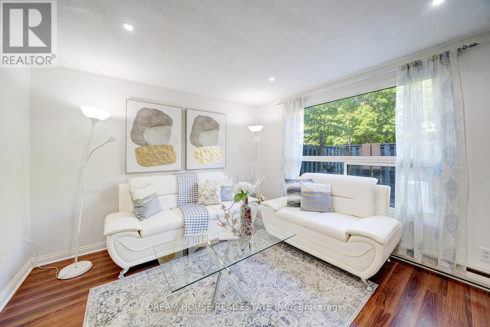 Photo 7 of 106 850 Huntingwood Drive, Toronto ON