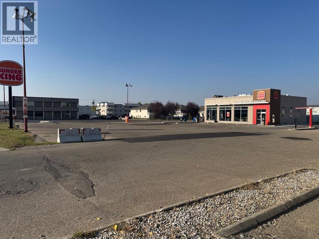 Photo 3 of 10808 100 Street, Grande Prairie AB