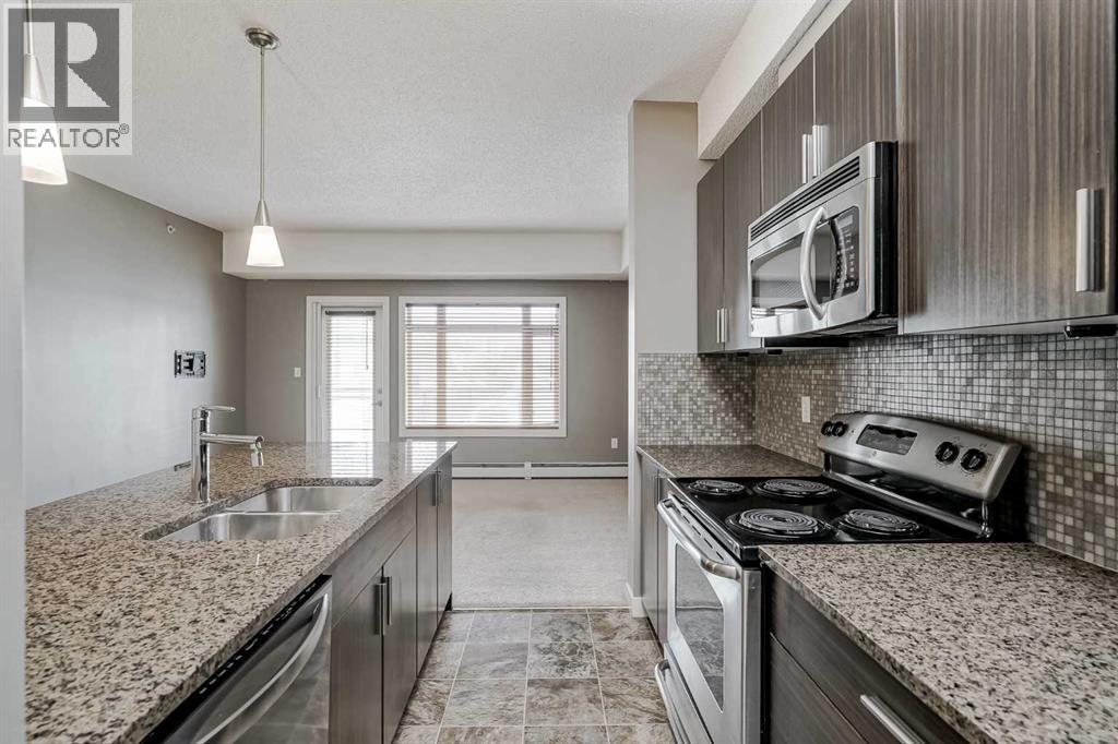 Photo 7 of 442 23 Millrise Drive Sw, Calgary AB