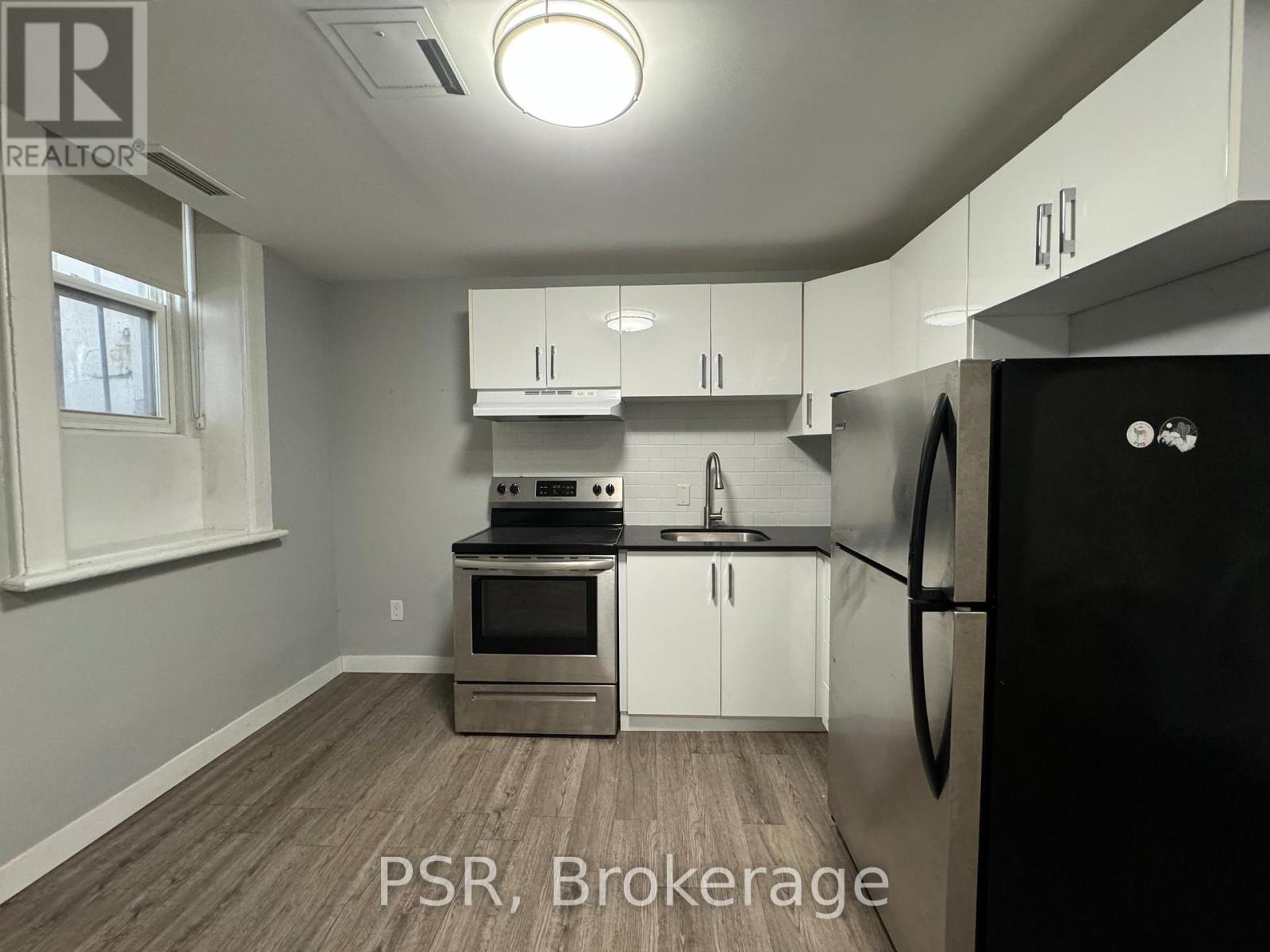 Photo 2 of 1 205 Gerrard Street E, Toronto ON