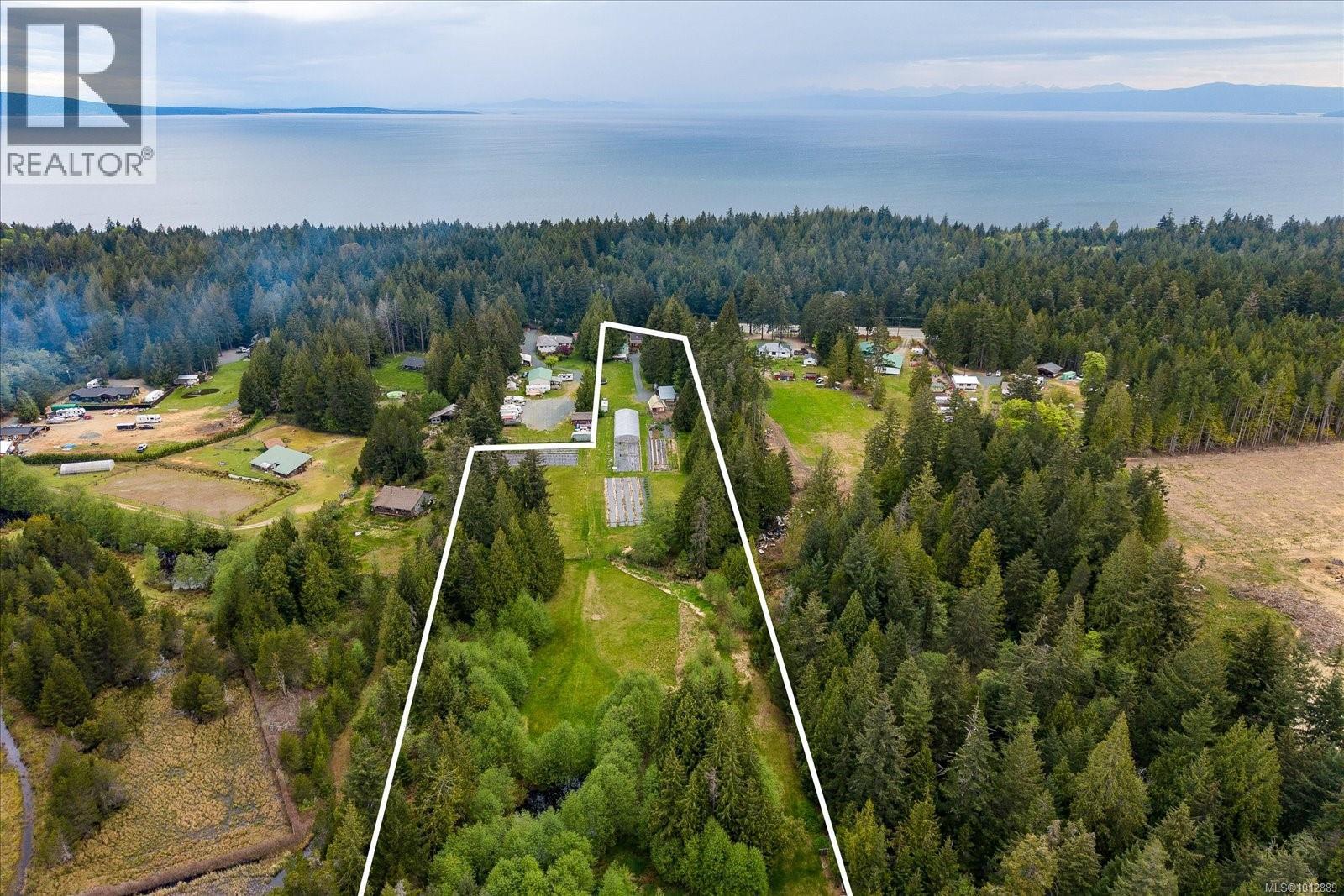 Photo 1 of 4800 Island Hwy W, Qualicum Beach BC