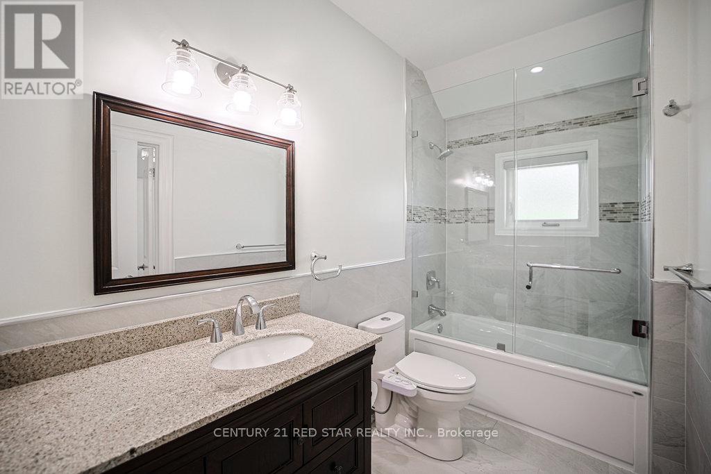 Photo 25 of 164 Elmhurst Drive, Toronto ON