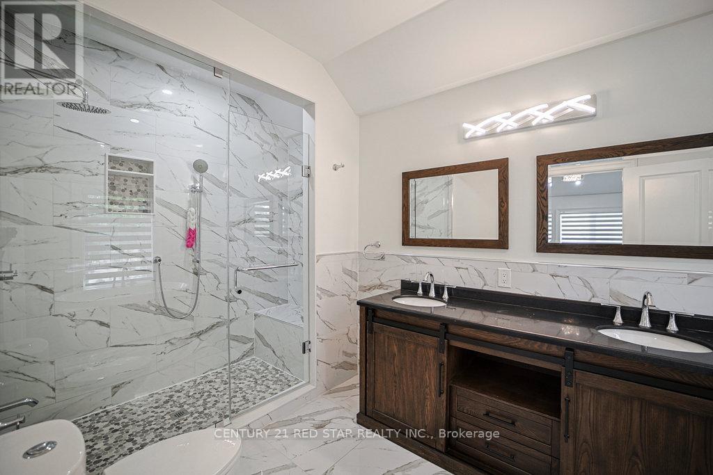 Photo 29 of 164 Elmhurst Drive, Toronto ON
