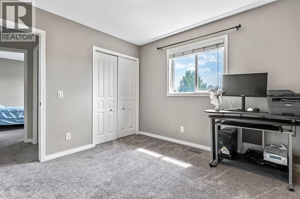 Photo 19 of 117 Channelside Cove Sw, Airdrie AB