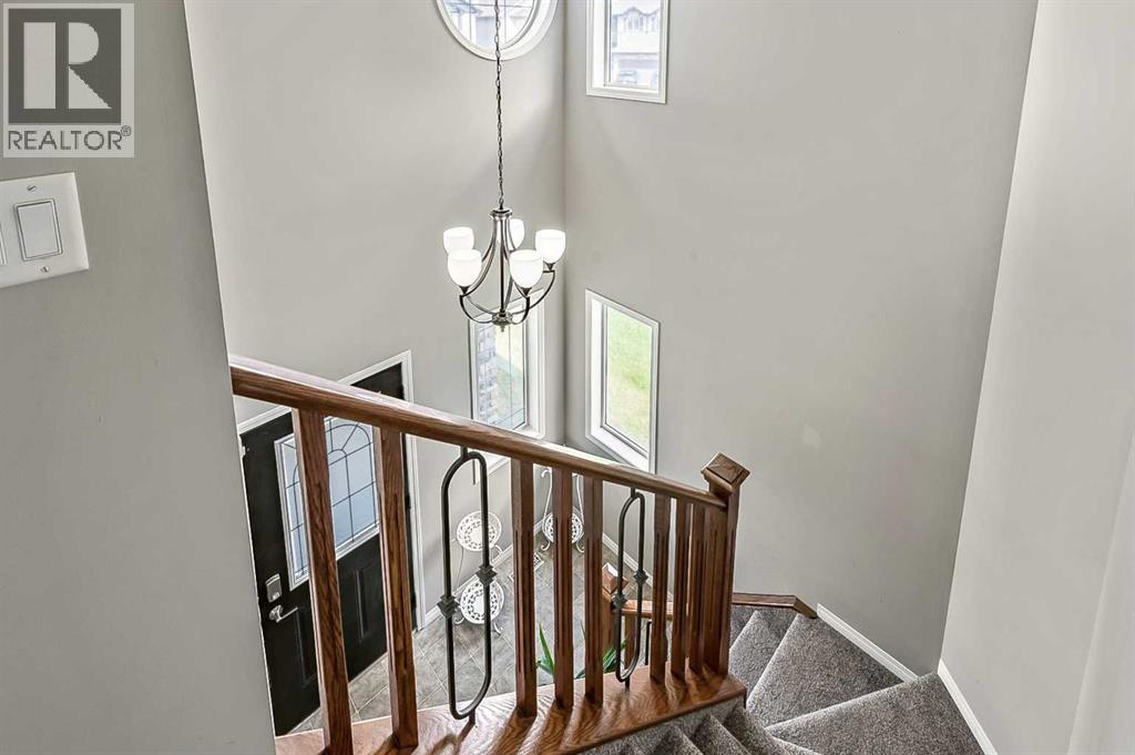Photo 13 of 117 Channelside Cove Sw, Airdrie AB