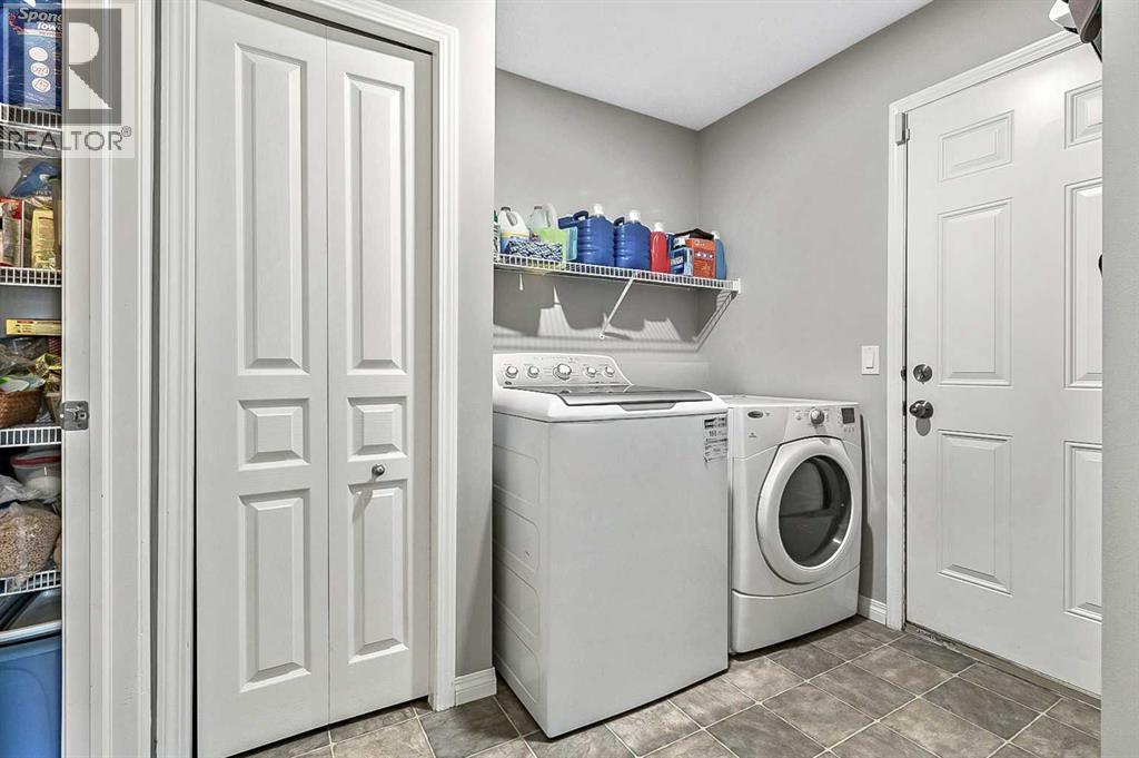 Photo 11 of 117 Channelside Cove Sw, Airdrie AB