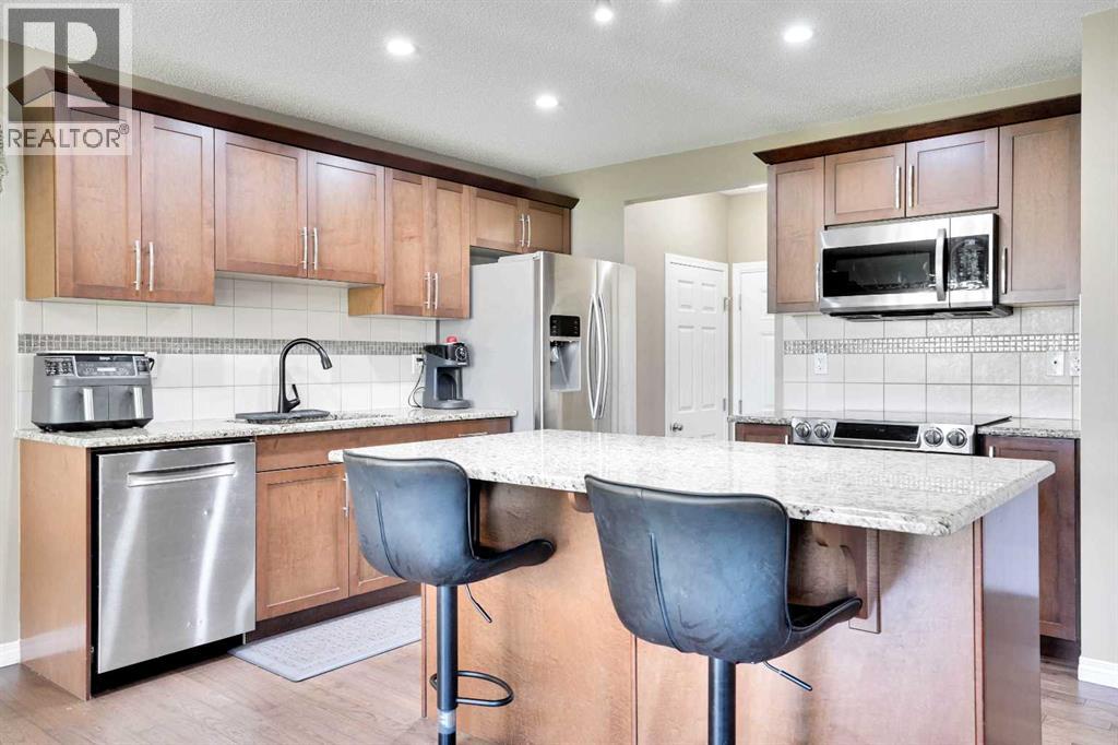 Photo 13 of 174 Windstone Avenue Sw, Airdrie AB