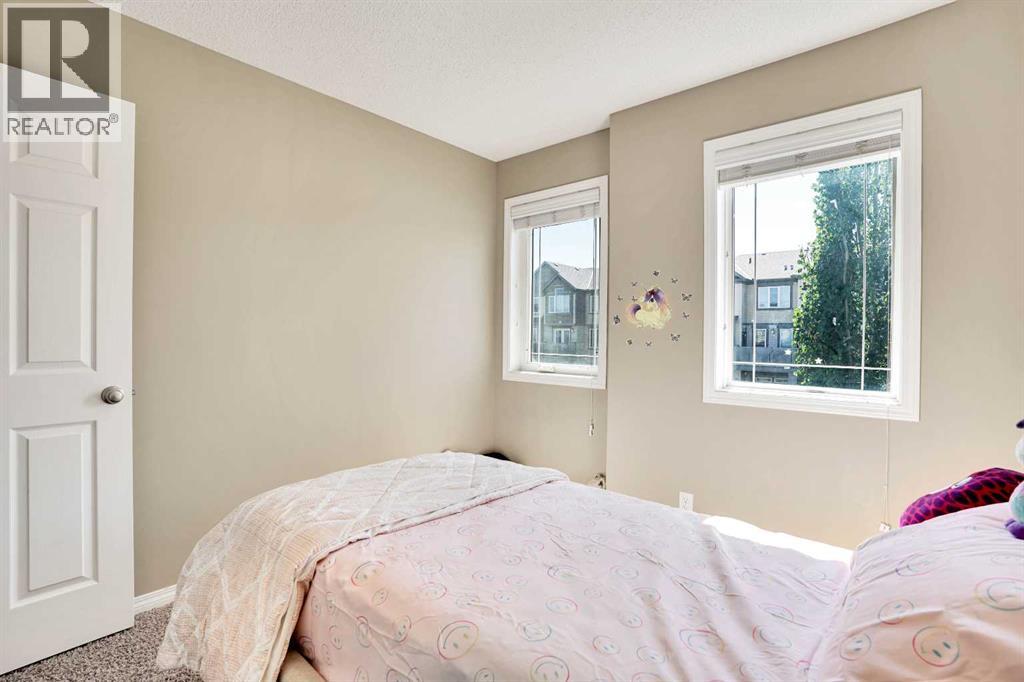 Photo 31 of 174 Windstone Avenue Sw, Airdrie AB