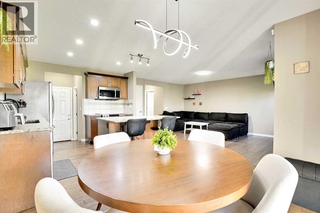 Photo 10 of 174 Windstone Avenue Sw, Airdrie AB