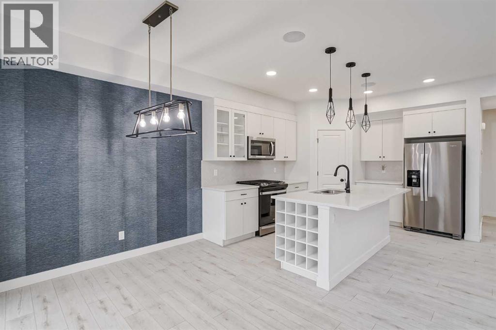 Photo 12 of 34 Belmont Crescent Sw, Calgary AB