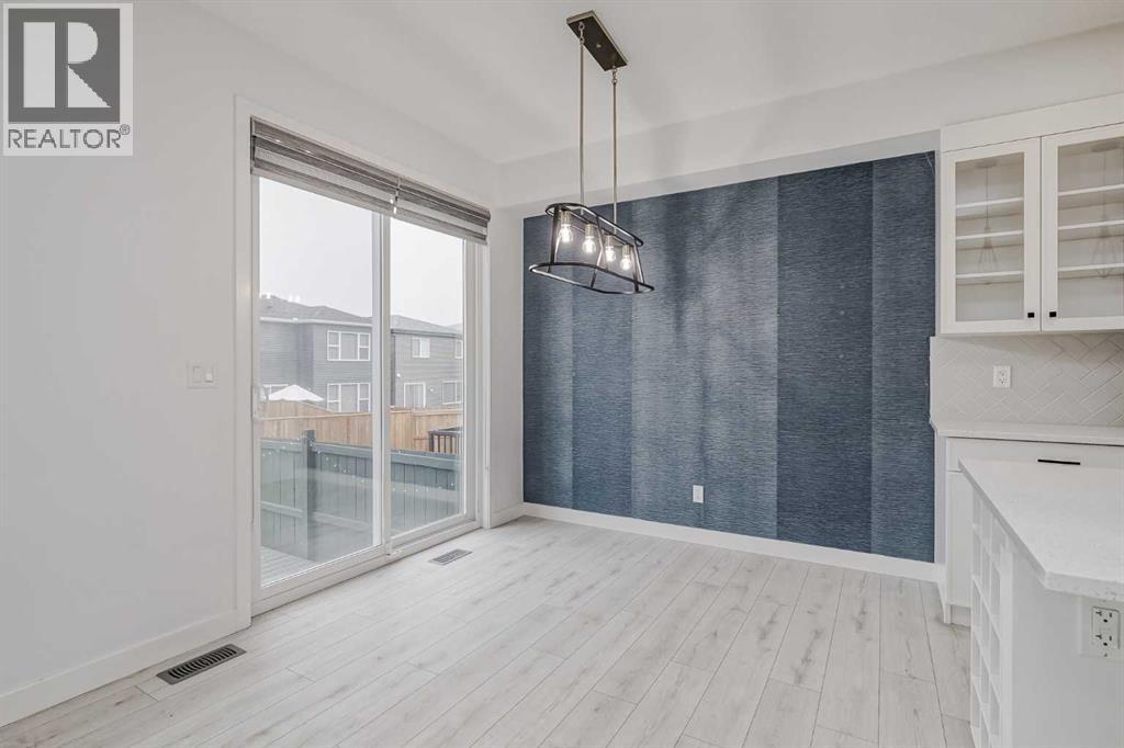 Photo 11 of 34 Belmont Crescent Sw, Calgary AB