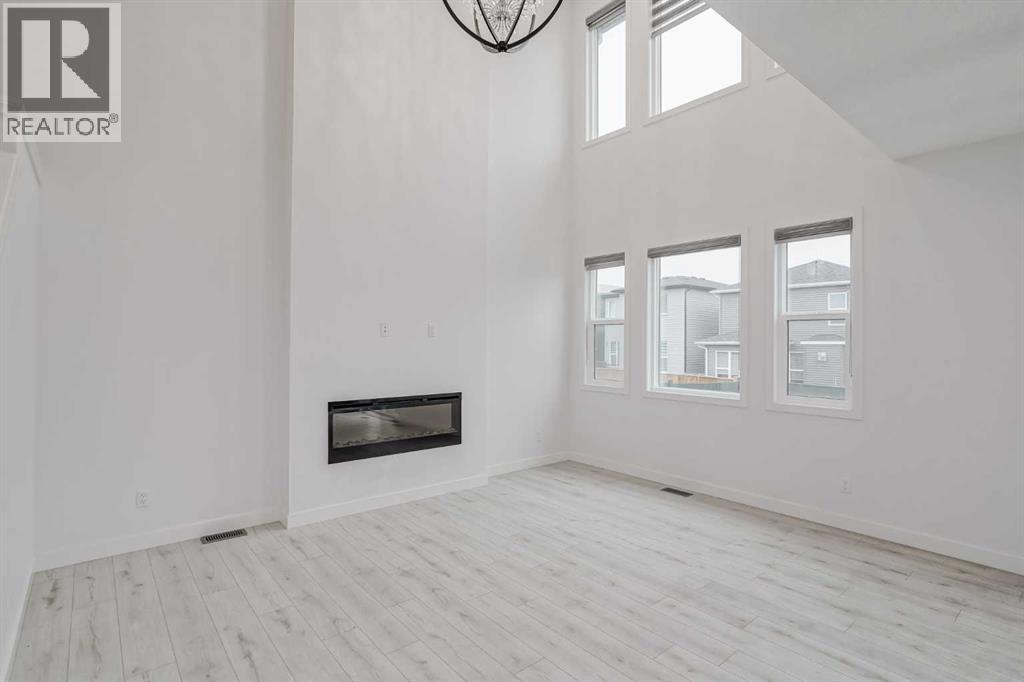 Photo 8 of 34 Belmont Crescent Sw, Calgary AB