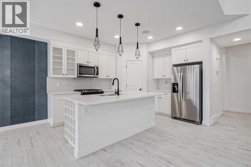 Photo 3 of 34 Belmont Crescent Sw, Calgary AB