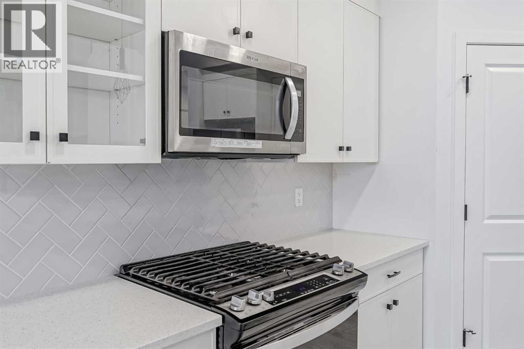 Photo 7 of 34 Belmont Crescent Sw, Calgary AB