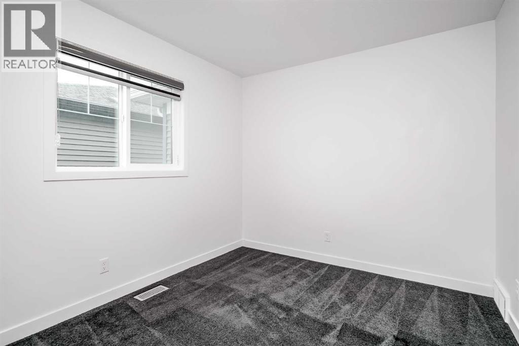 Photo 31 of 34 Belmont Crescent Sw, Calgary AB