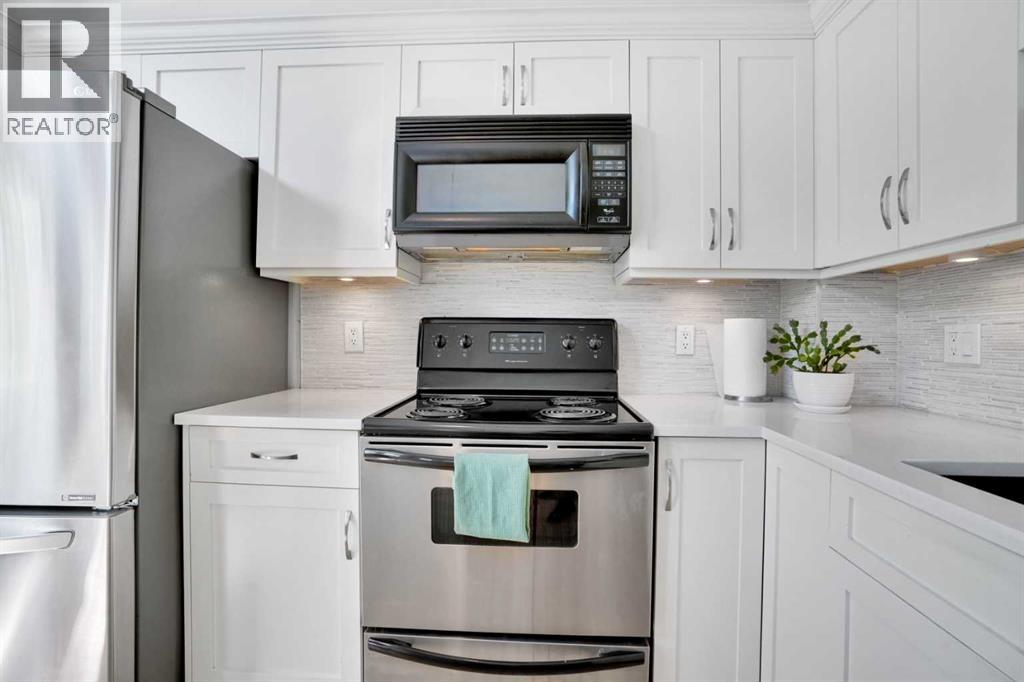 Photo 5 of 54 Cougar Ridge Mews Sw, Calgary AB