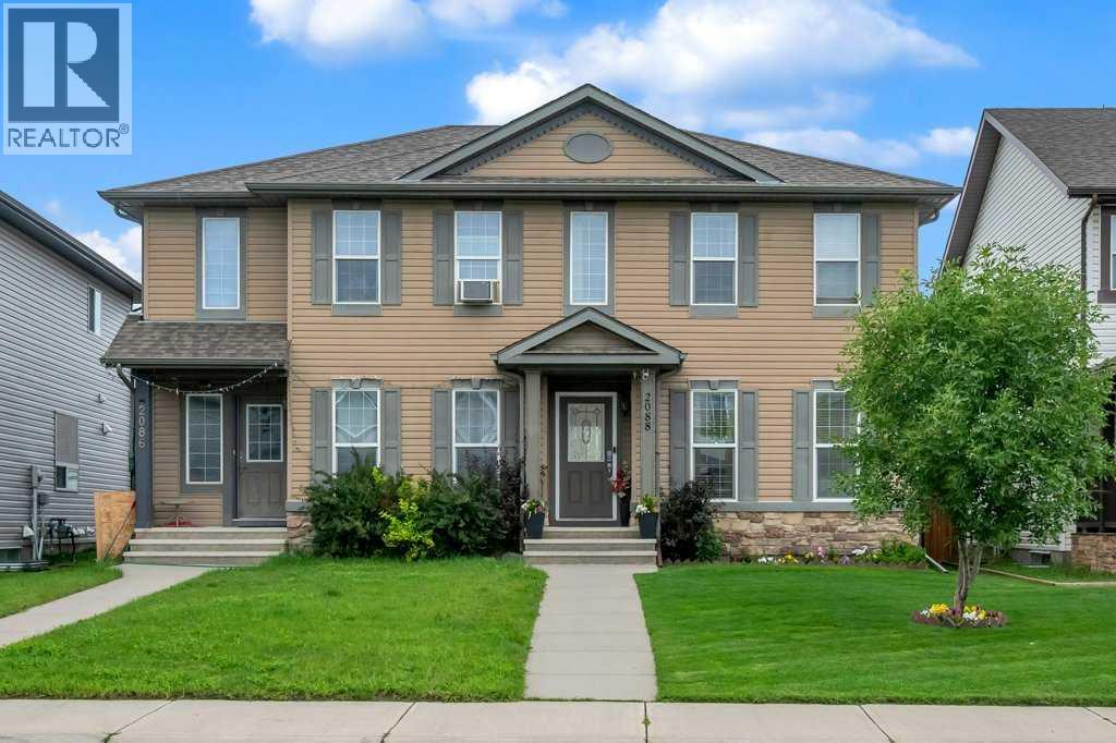 Photo 1 of 2088 Luxstone Boulevard Sw, Airdrie AB