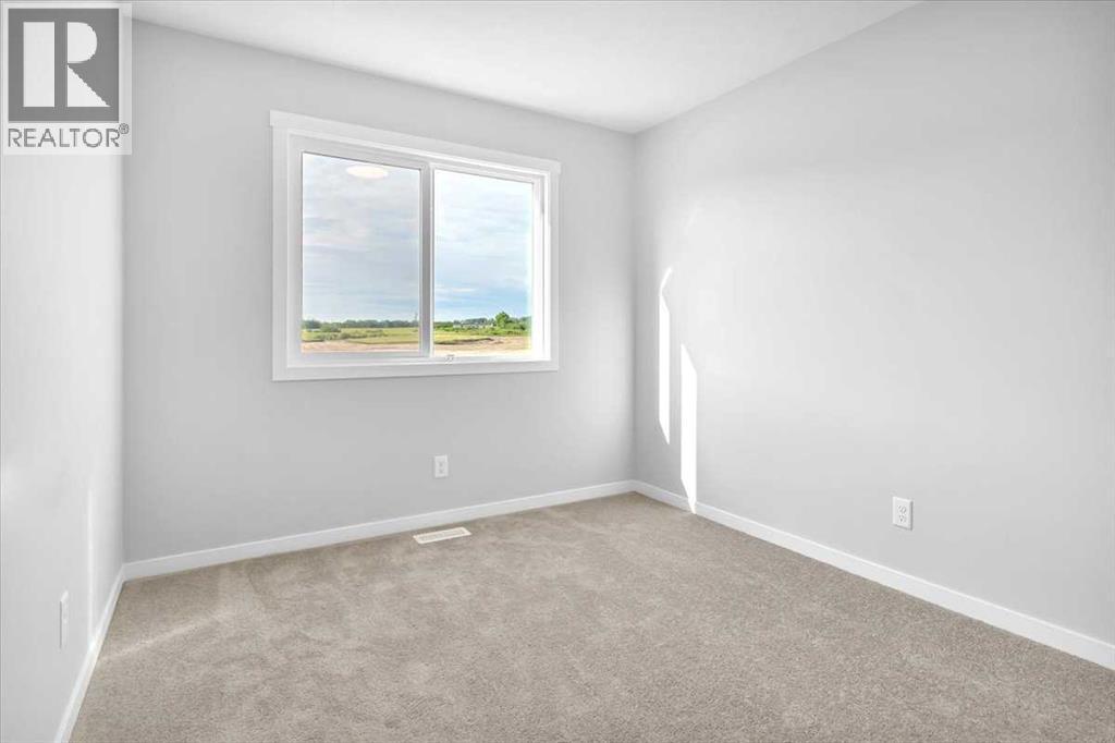 Photo 18 of 74 Wedderburn Drive, Okotoks AB