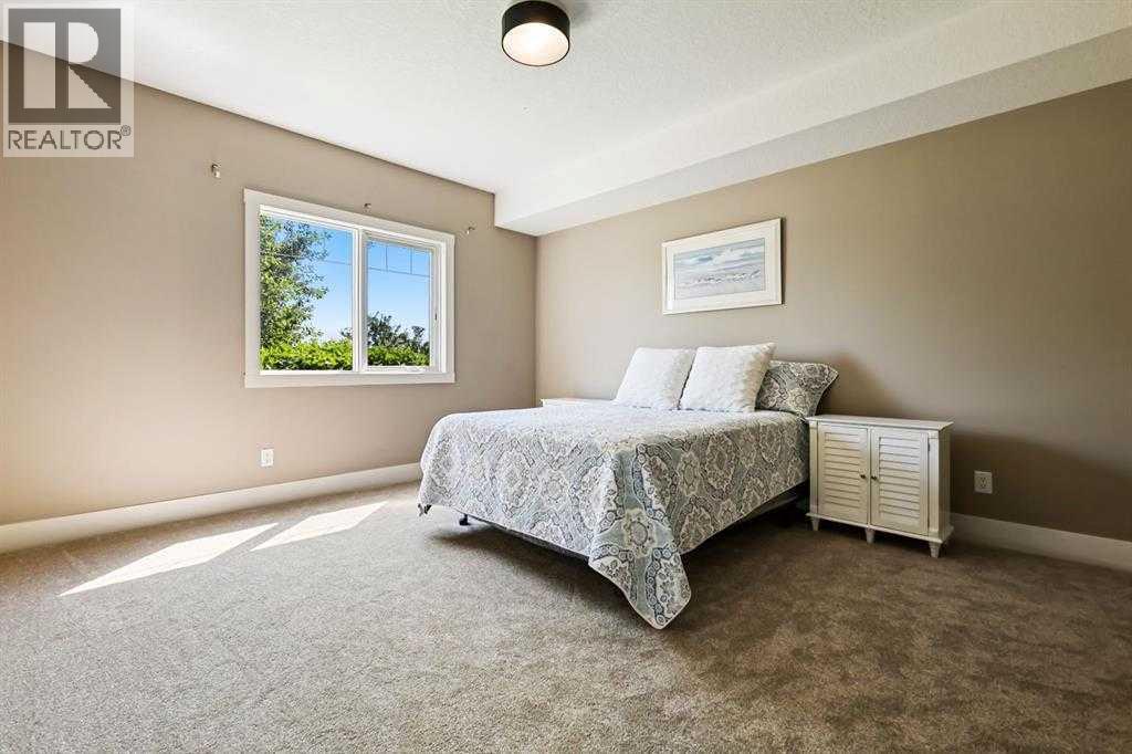 Photo 16 of 107 77 George Fox Trail, Cochrane AB