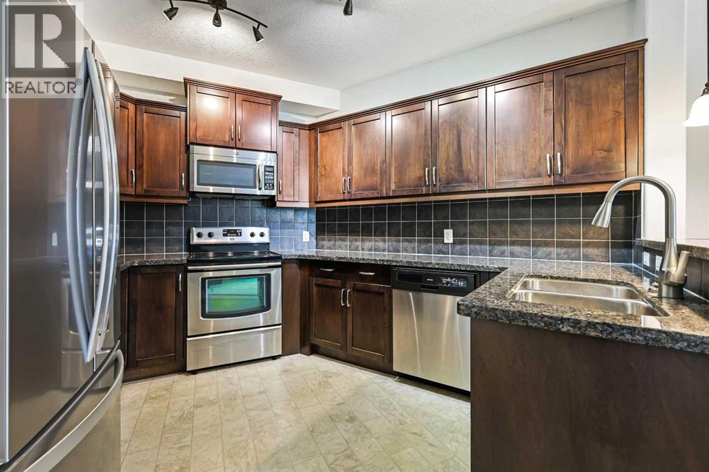 Photo 10 of 107 77 George Fox Trail, Cochrane AB