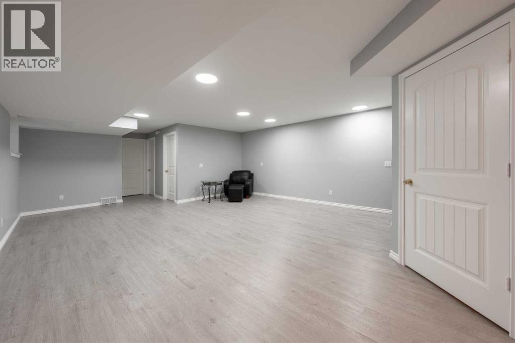 Single Family House Bi-level for Sale in  Laguna Way NE Monterey Park Calgary 