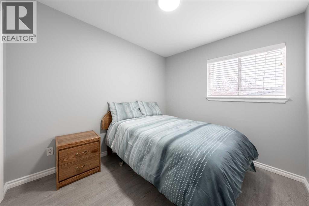 Single Family House Bi-level for Sale in  Laguna Way NE Monterey Park Calgary 