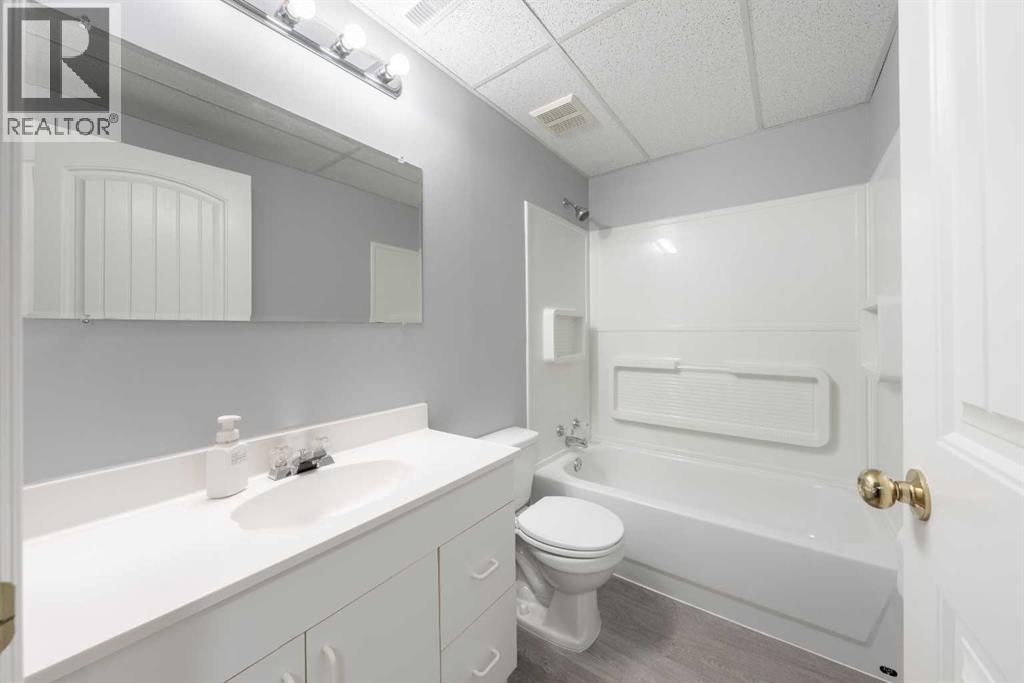 Single Family House Bi-level for Sale in  Laguna Way NE Monterey Park Calgary 