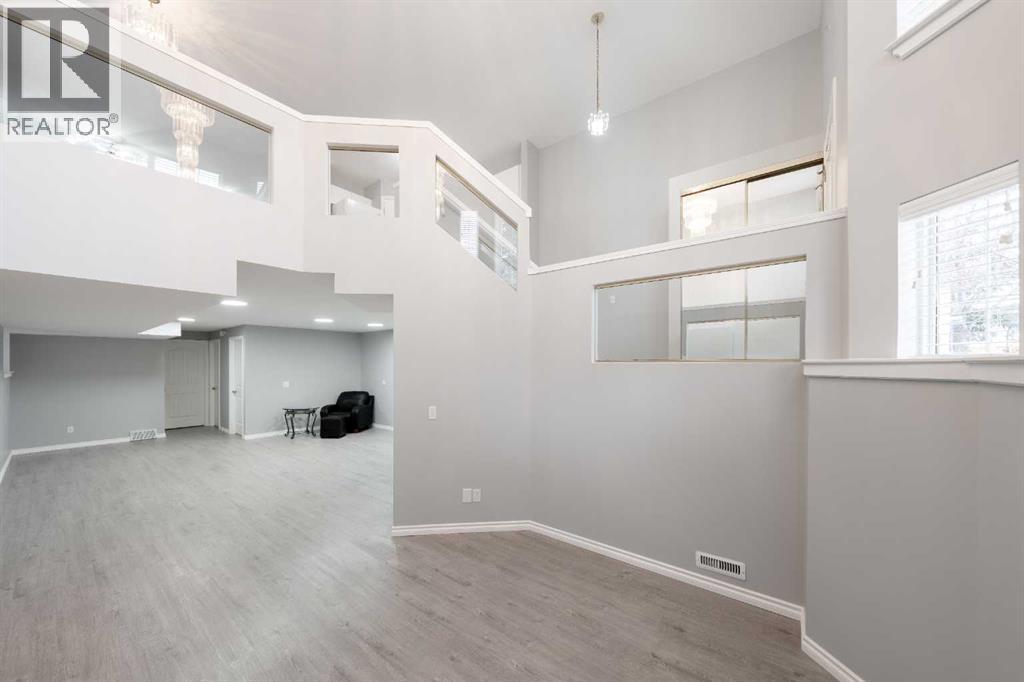 Single Family House Bi-level for Sale in  Laguna Way NE Monterey Park Calgary 