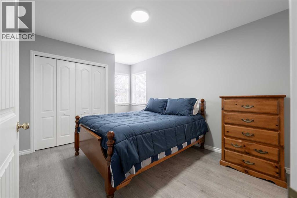 Single Family House Bi-level for Sale in  Laguna Way NE Monterey Park Calgary 