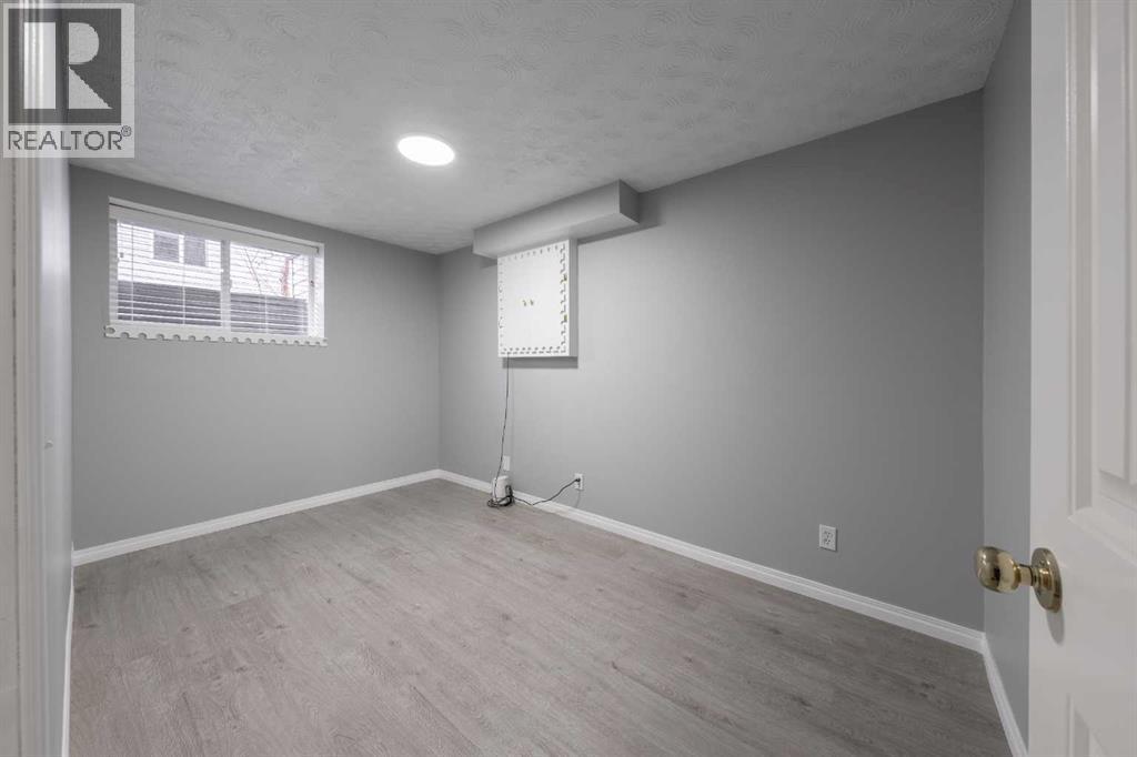 Single Family House Bi-level for Sale in  Laguna Way NE Monterey Park Calgary 