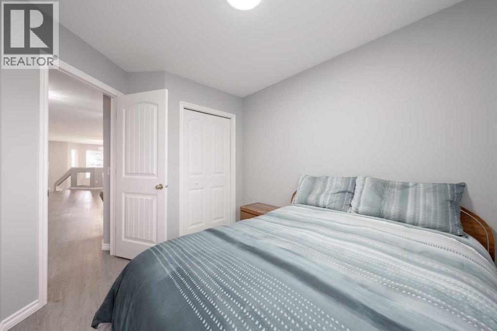 Single Family House Bi-level for Sale in  Laguna Way NE Monterey Park Calgary 