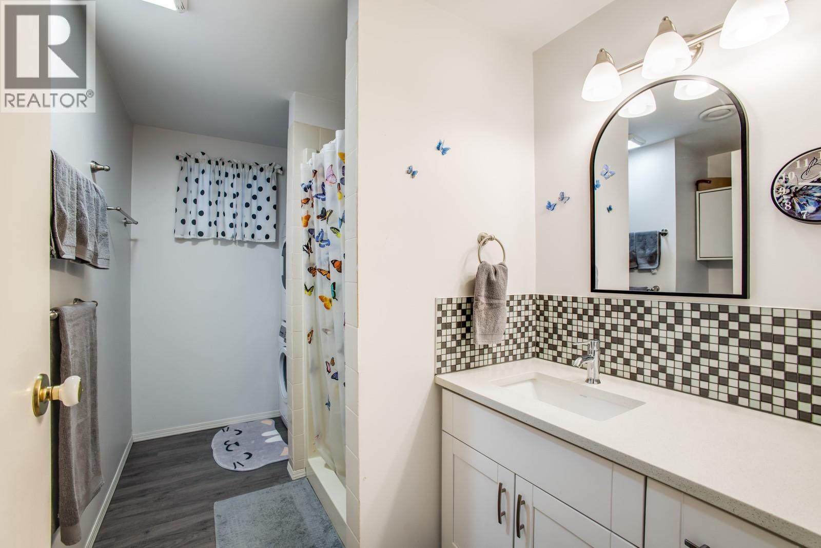 Photo 29 of 1650 Highland Drive N, Kelowna BC