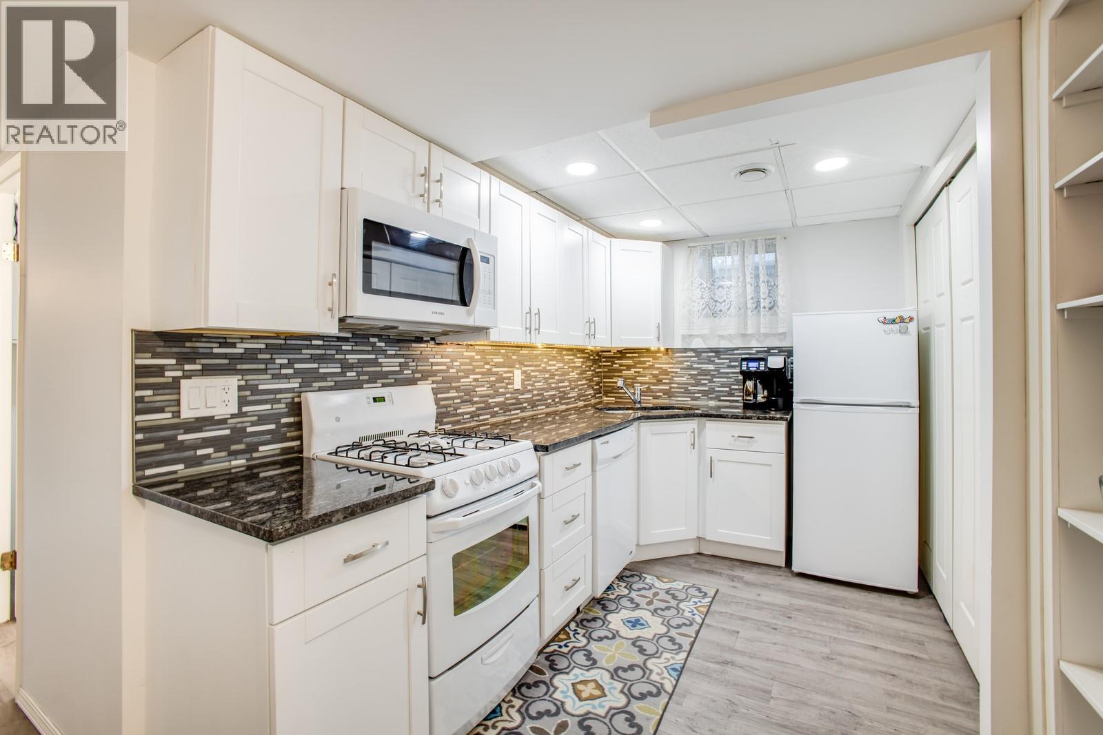 Photo 26 of 1650 Highland Drive N, Kelowna BC