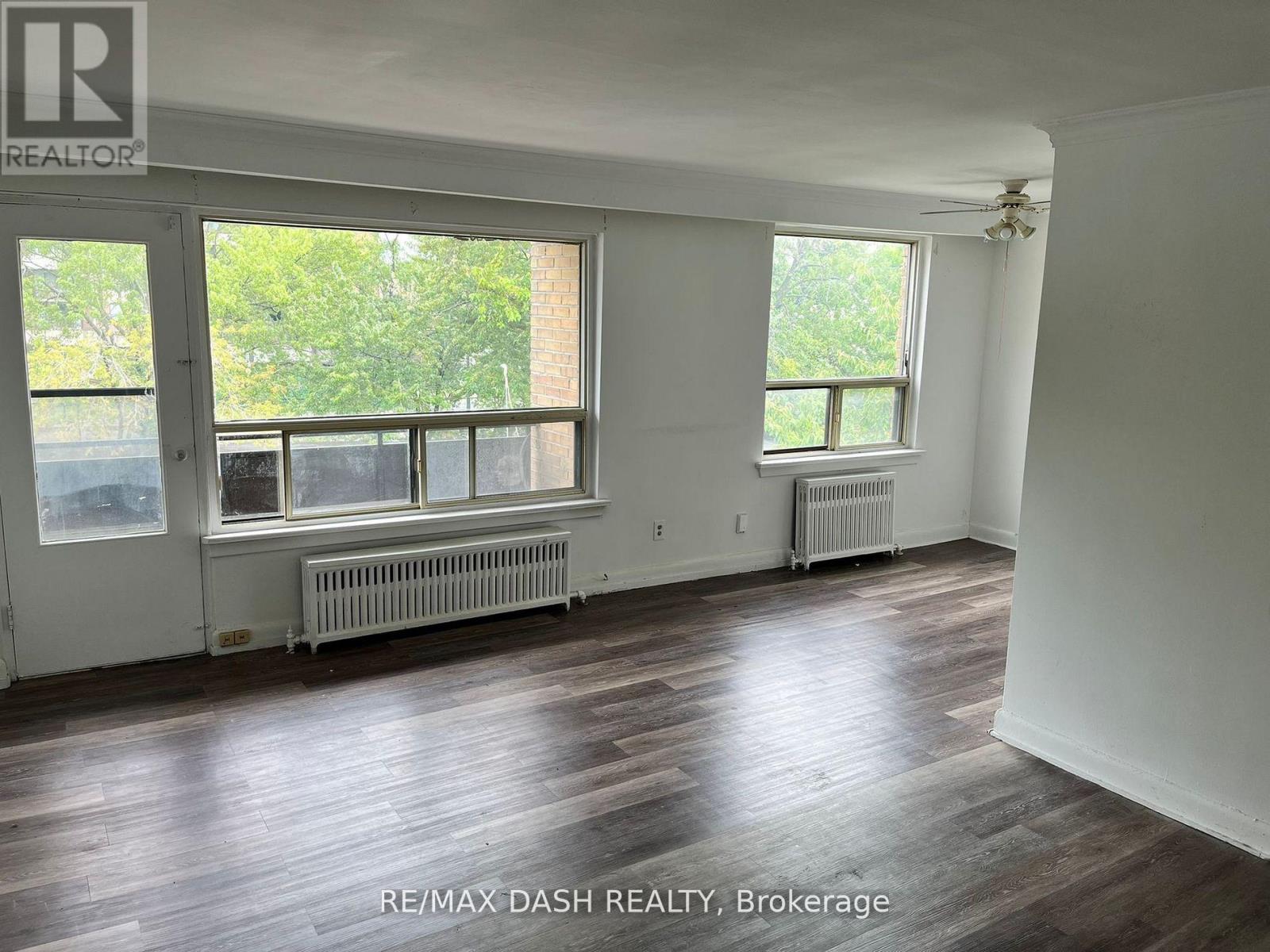 Photo 3 of 8 52 Neptune Drive, Toronto ON