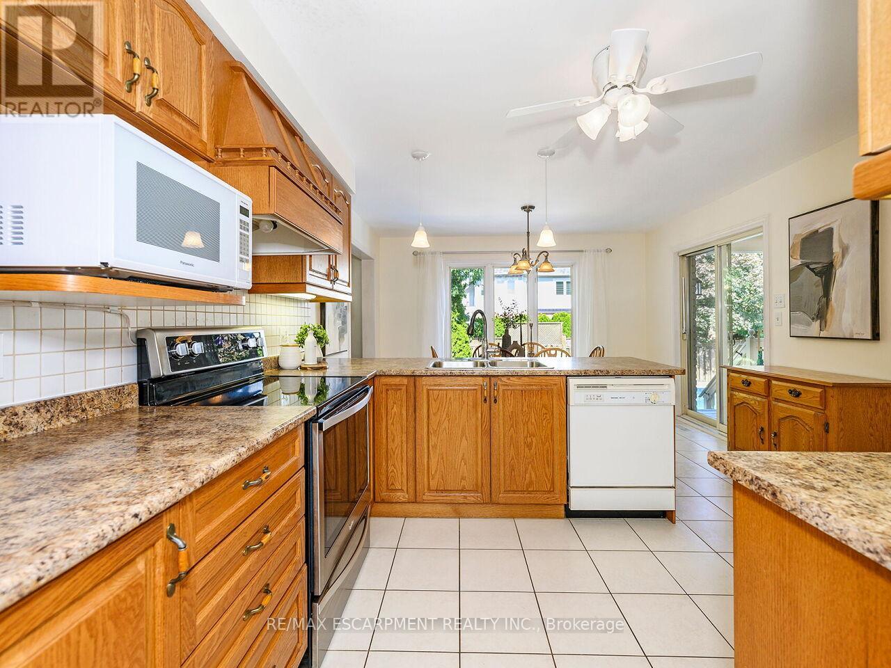 Photo 11 of 2026 Waterbridge Drive, Burlington ON