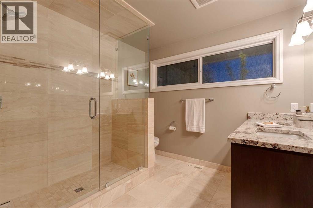 Photo 24 of 130 Windermere Road Sw, Calgary AB