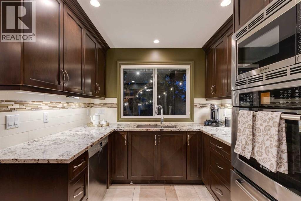 Photo 3 of 130 Windermere Road Sw, Calgary AB