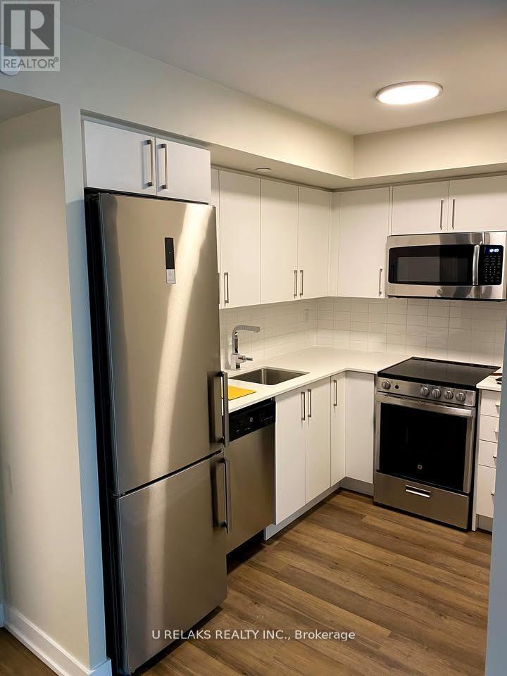 Photo 3 of 427 38 Monte Kwinter Court, Toronto ON
