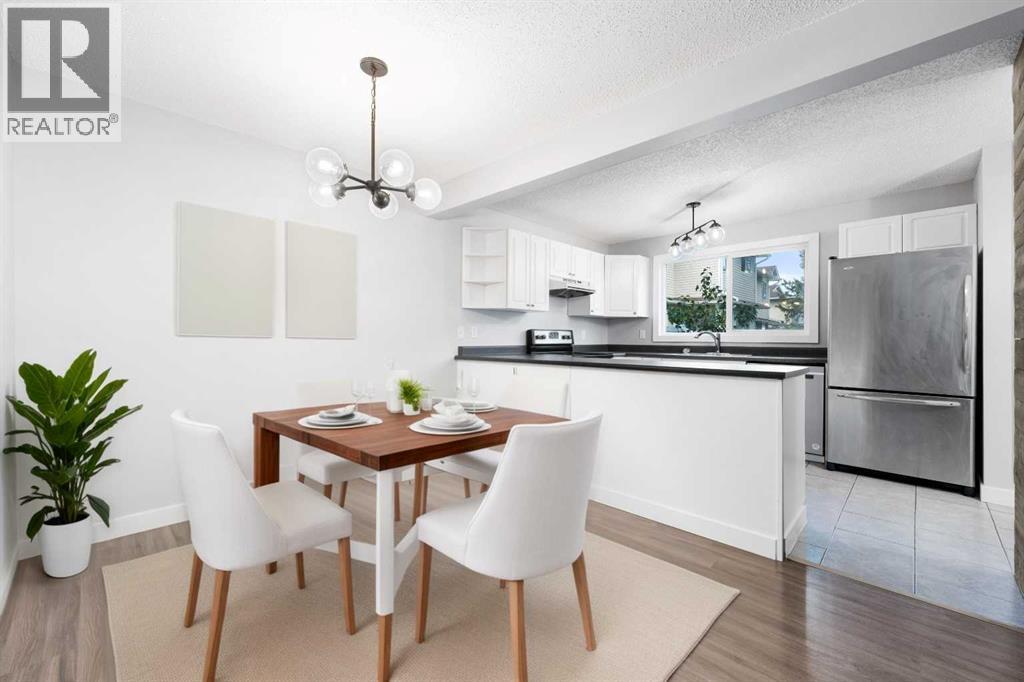 Photo 7 of 142 Woodmont Terrace Sw, Calgary AB