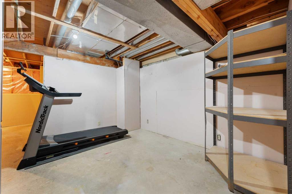 Photo 21 of 142 Woodmont Terrace Sw, Calgary AB